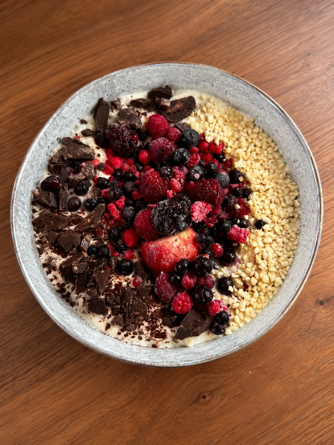 Protein Rice Pudding with Berries and Dark Chocolate